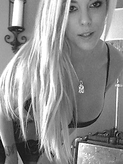 xoGisele wears a crotchless body suit and has some fun in front of the webcam